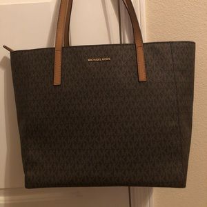 Original and brand new with tag Michael Kors